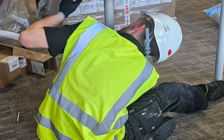 ReloCore UK installer assembling office furniture